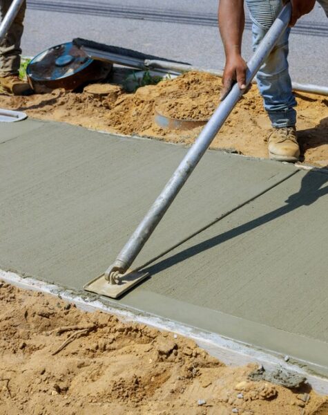 worker-plastering-concrete-cement-sidewalk_73110-8630 worker-plastering-concrete-cement-sidewalk_73110-8630